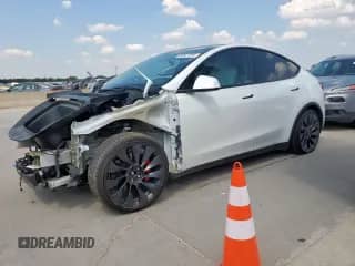 2022 Tesla Model Y Performance with VIN 7SAYGDEF6NF536532, listed as a Copart auction lot 80821345 with 56,233 mi miles and Salvage title. Bid and sale history available at DreamBid. Image 1.