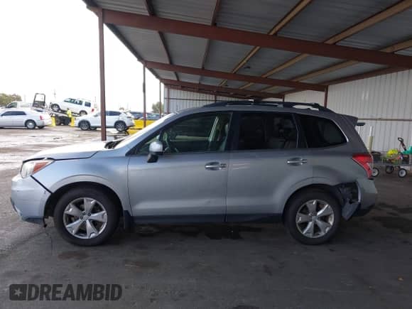 2014 Subaru Forester Limited with VIN JF2SJAJC4EH512424, listed as a IAAI auction lot 43364205 with 162,665 mi miles and . Bid and sale history available at DreamBid. Image 14.
