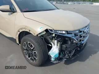 2023 Hyundai Santa Cruz SEL Premium z VIN 5NTJDDAF0PH074939, wystawiony jako IAAI lot #43152034 z przebiegiem 30 455 mil mil oraz . Historia ofert i sprzedaży dostępna na DreamBid. Obrazek 6.