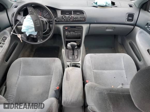 1997 Honda Accord LX with VIN 1HGCD5638VA234390, listed as a Copart auction lot 68820625 with 184,122 mi miles and Salvage title. Bid and sale history available at DreamBid. Image 8.