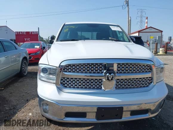 2018 Ram 1500 Laramie z VIN 1C6RR7NT0JS131161, wystawiony jako IAAI lot #42457461 z przebiegiem 89 410 mil mil oraz . Historia ofert i sprzedaży dostępna na DreamBid. Obrazek 12.