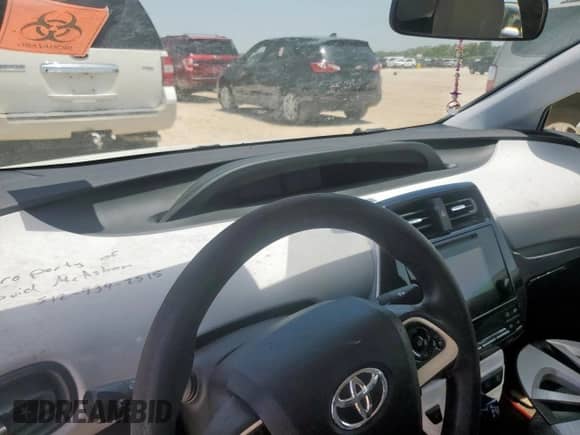 2016 Toyota Prius Three z VIN JTDKARFU8G3500405, wystawiony jako Copart lot #64698235 z przebiegiem Nie podano mil oraz Szkoda całkowita • Salvage title. Historia ofert i sprzedaży dostępna na DreamBid. Obrazek 9.