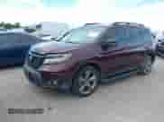 2019 Honda Passport Touring with VIN 5FNYF7H95KB004417, listed as a IAAI auction lot 42551496 with 62,948 mi miles and . Bid and sale history available at DreamBid. Image 2.