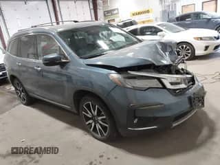 2019 Honda Pilot Touring 7-Passenger z VIN 5FNYF6H64KB004134, wystawiony jako IAAI lot #43353616 z przebiegiem 92 735 mil mil oraz . Historia ofert i sprzedaży dostępna na DreamBid. Obrazek 1.