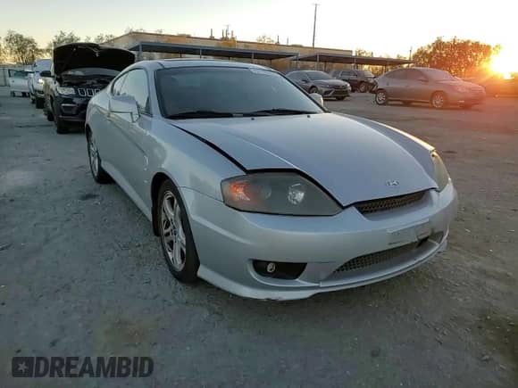 2005 Hyundai Tiburon GT с VIN KMHHN65F05U171038, выставлен на аукционе Copart как лот 87765735 с пробегом 113 129 миль миль и Списание • Salvage title. История ставок и продаж доступна на DreamBid. Изображение 11.