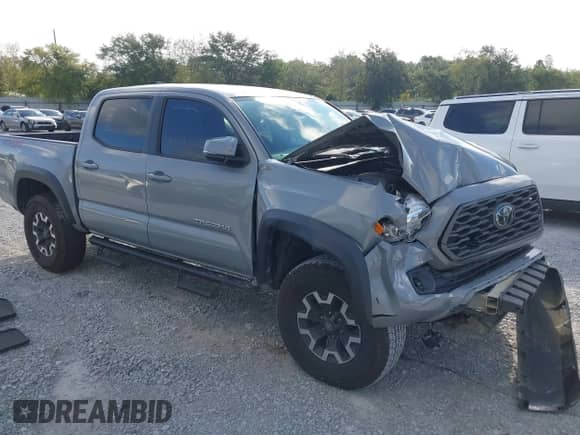 2021 Toyota Tacoma SR with VIN 3TYCZ5ANXMT024937, listed as a IAAI auction lot 43314888 with 77,580 mi miles and . Bid and sale history available at DreamBid. Image 1.