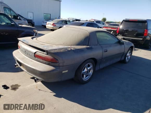 1995 Chevrolet Camaro Z28 z VIN 2G1FP22P5S2209451, wystawiony jako Copart lot #73392574 z przebiegiem 127 062 mil mil oraz Czysty tytuł • Clean title. Historia ofert i sprzedaży dostępna na DreamBid. Obrazek 4.