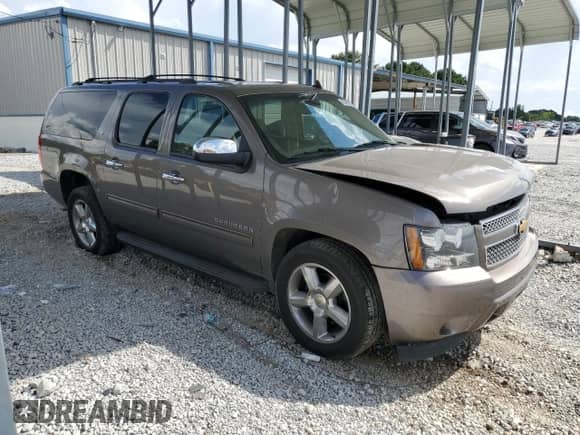 2014 Chevrolet Suburban LT with VIN 1GNSCJE01ER151230, listed as a Copart auction lot 63072005 with 178,119 mi miles and Salvage title. Bid and sale history available at DreamBid. Image 4.