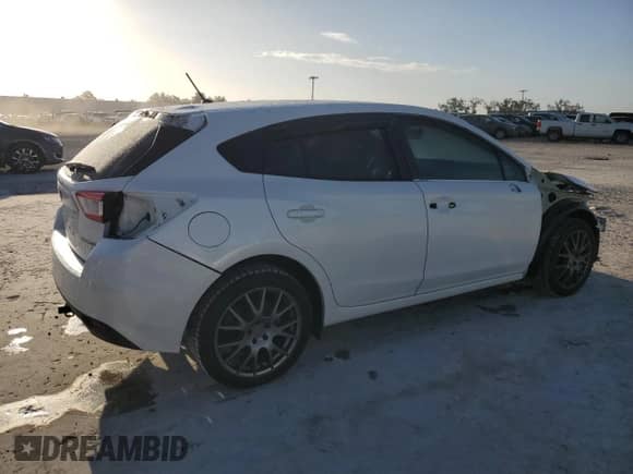 2017 Subaru Impreza with VIN 4S3GTAA68H1723616, listed as a Copart auction lot 77035964 with 93,430 mi miles and Salvage title. Bid and sale history available at DreamBid. Image 3.
