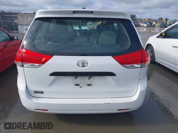 2012 Toyota Sienna with VIN 5TDZK3DC8CS180806, listed as a IAAI auction lot 42401264 with 201,007 mi miles and . Bid and sale history available at DreamBid. Image 16.