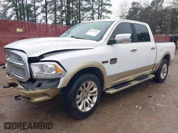 2015 Ram 1500 Laramie Longhorn with VIN 1C6RR7PM6FS569342, listed as a IAAI auction lot 41551242 with 192,496 mi miles and . Bid and sale history available at DreamBid. Image 22.