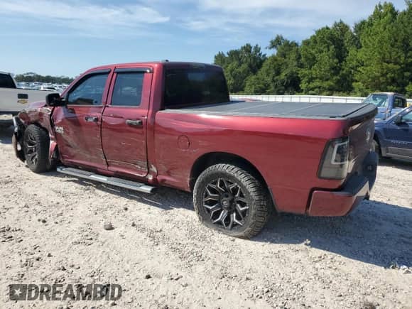 2018 Ram 1500 Tradesman z VIN 1C6RR6FG1JS325001, wystawiony jako Copart lot #80193395 z przebiegiem 100 575 mil mil oraz Szkoda całkowita • Salvage title. Historia ofert i sprzedaży dostępna na DreamBid. Obrazek 2.