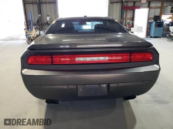 2014 Dodge Challenger R/T с VIN 2C3CDYBTXEH137042, выставлен на аукционе Copart как лот 63372975 с пробегом 173 542 миль миль и Списание • Salvage title. История ставок и продаж доступна на DreamBid. Изображение 6.