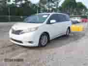 2012 Toyota Sienna XLE with VIN 5TDYK3DC4CS231407, listed as a IAAI auction lot 43531271 with 382,802 mi miles and . Bid and sale history available at DreamBid. Image 2.