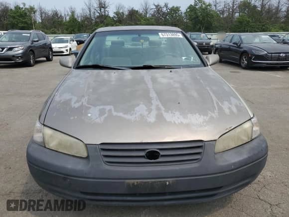 1997 Toyota Camry LE с VIN 4T1BG22K6VU065896, выставлен на аукционе Copart как лот 67313895 с пробегом 252 321 миль миль и Списание • Salvage title. История ставок и продаж доступна на DreamBid. Изображение 5.