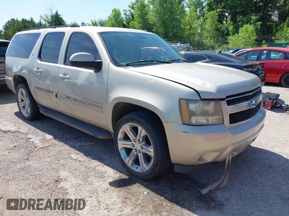 2007 Chevrolet Suburban LS with VIN 1GNFC16087J218794, listed as a IAAI auction lot 42700630 with 262,428 mi miles and . Bid and sale history available at DreamBid. Image 1.