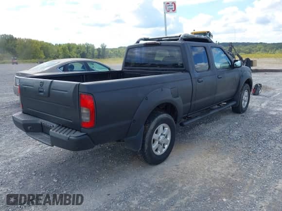 2003 Nissan Frontier XE with VIN 1N6ED29X93C409300, listed as a IAAI auction lot 43339329 with 288,807 mi miles and . Bid and sale history available at DreamBid. Image 4.