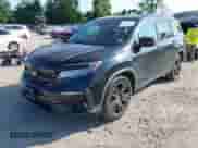 2020 Honda Pilot Black Edition z VIN 5FNYF6H70LB065393, wystawiony jako IAAI lot #42775428 z przebiegiem 63 950 mil mil oraz . Historia ofert i sprzedaży dostępna na DreamBid. Obrazek 2.