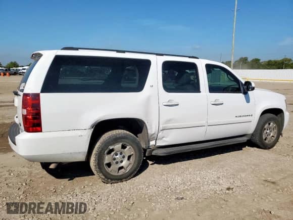 2007 Chevrolet Suburban LS с VIN 1GNFC16J97R179871, выставлен на аукционе Copart как лот 71671225 с пробегом 214 651 миль миль и Списание • Salvage title. История ставок и продаж доступна на DreamBid. Изображение 3.