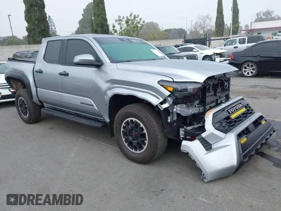 2024 Toyota Tacoma SR5 with VIN 3TMLB5JN6RM022612, listed as a IAAI auction lot 41611378 with 7,275 mi miles and . Bid and sale history available at DreamBid. Image 1.