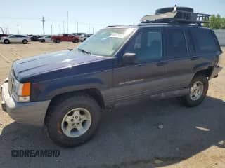 1998 Jeep Grand Cherokee Laredo с VIN 1J4GZ58S1WC135030, выставлен на аукционе Copart как лот 63221145 с пробегом 249 884 миль миль и Списание • Salvage title. История ставок и продаж доступна на DreamBid. Изображение 1.