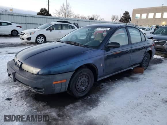 1999 Saturn SL с VIN 1G8ZF528XXZ164152, выставлен на аукционе Copart как лот 88041905 с пробегом 175 709 миль миль и Списание • Salvage title. История ставок и продаж доступна на DreamBid. Изображение 1.