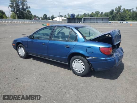 2000 Saturn SL с VIN 1G8ZG5283YZ193622, выставлен на аукционе Copart как лот 67871375 с пробегом 337 201 миль миль и Списание • Salvage title. История ставок и продаж доступна на DreamBid. Изображение 2.