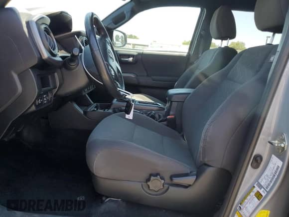 2018 Toyota Tacoma SR5 с VIN 3TMBZ5DN1JM013291, выставлен на аукционе Copart как лот 64250585 с пробегом 95 044 миль миль и Списание • Salvage title. История ставок и продаж доступна на DreamBid. Изображение 7.