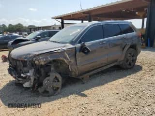 2016 Jeep Grand Cherokee High Altitude with VIN 1C4RJECG5GC320370, listed as a Copart auction lot 69617535 with 170,696 mi miles and Salvage title. Bid and sale history available at DreamBid. Image 1.