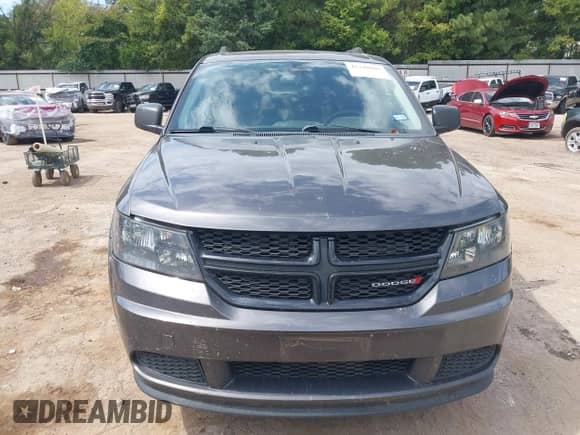 2018 Dodge Journey SE z VIN 3C4PDCAB0JT196286, wystawiony jako IAAI lot #43340985 z przebiegiem 172 838 mil mil oraz . Historia ofert i sprzedaży dostępna na DreamBid. Obrazek 12.
