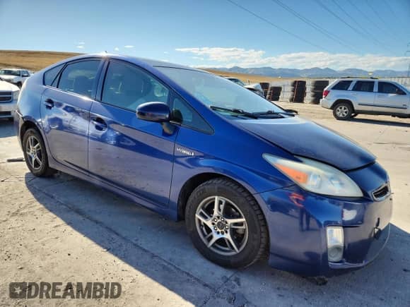 2011 Toyota Prius III with VIN JTDKN3DUXB0275323, listed as a Copart auction lot 84953585 with 311,460 mi miles and Salvage title. Bid and sale history available at DreamBid. Image 4.