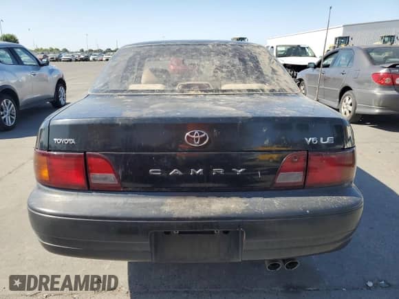 1995 Toyota Camry LE z VIN 4T1GK12E9SU084799, wystawiony jako Copart lot #61012455 z przebiegiem 179 743 mil mil oraz Czysty tytuł • Clean title. Historia ofert i sprzedaży dostępna na DreamBid. Obrazek 6.