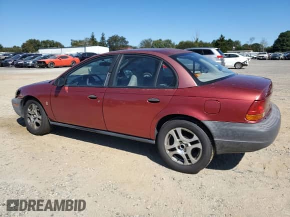 1998 Saturn SL with VIN 1G8ZH528XWZ144301, listed as a Copart auction lot 75918414 with 219,256 mi miles and Salvage title. Bid and sale history available at DreamBid. Image 2.