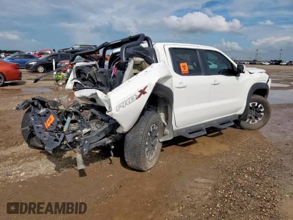 2022 Nissan Frontier Pro-X z VIN 1N6ED1EJ8NN675913, wystawiony jako Copart lot #62930635 z przebiegiem 35 858 mil mil oraz Szkoda całkowita • Salvage title. Historia ofert i sprzedaży dostępna na DreamBid. Obrazek 3.