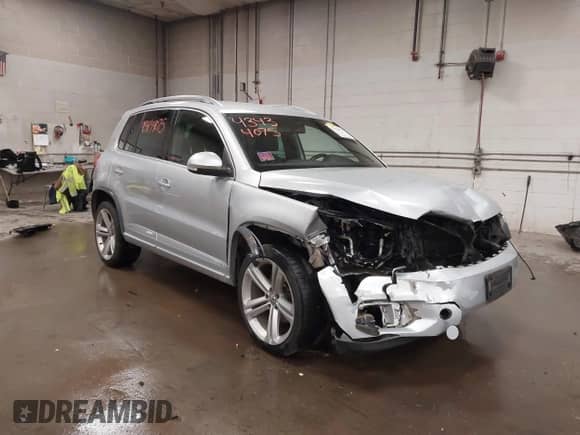 2016 Volkswagen Tiguan SEL with VIN WVGBV7AX0GW073628, listed as a IAAI auction lot 43434075 with 134,208 mi miles and . Bid and sale history available at DreamBid. Image 1.