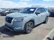 2023 Nissan Pathfinder Platinum with VIN 5N1DR3DH9PC248888, listed as a IAAI auction lot 41974684 with 52,609 mi miles and . Bid and sale history available at DreamBid. Image 2.