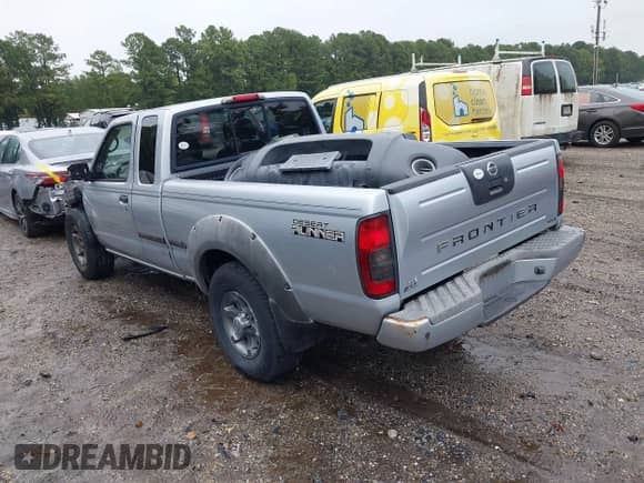 2002 Nissan Frontier XE with VIN 1N6ED26T82C316428, listed as a IAAI auction lot 43193106 with 184,919 mi miles and . Bid and sale history available at DreamBid. Image 3.