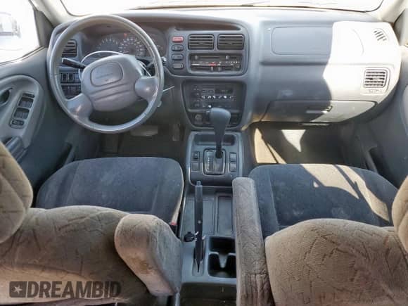 2003 Chevrolet Tracker LT с VIN 2CNBE634936928716, выставлен на аукционе Copart как лот 71214825 с пробегом 156 803 миль миль и Списание • Salvage title. История ставок и продаж доступна на DreamBid. Изображение 8.