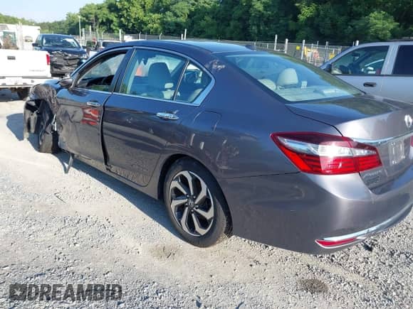 2016 Honda Accord EX-L with VIN 1HGCR2F98GA009040, listed as a IAAI auction lot 42711353 with 166,258 mi miles and . Bid and sale history available at DreamBid. Image 3.