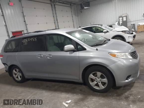 2011 Toyota Sienna LE AAS with VIN 5TDKK3DCXBS121031, listed as a IAAI auction lot 42531488 with 231,860 mi miles and . Bid and sale history available at DreamBid. Image 14.