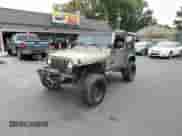 2004 Jeep Wrangler X z VIN 1J4FA39S64P753911, wystawiony jako Copart lot #86479285 z przebiegiem 138 801 mil mil oraz Czysty tytuł • Clean title. Historia ofert i sprzedaży dostępna na DreamBid. Obrazek 2.