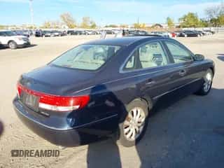 2006 Hyundai Azera SE z VIN KMHFC46F16A057813, wystawiony jako IAAI lot #43522257 z przebiegiem 165 432 mil mil oraz . Historia ofert i sprzedaży dostępna na DreamBid. Obrazek 4.