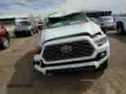 2020 Toyota Tacoma TRD Off Road с VIN 3TMCZ5AN1LM290275, выставлен на аукционе Copart как лот 81657685 с пробегом 131 128 миль миль и На запчасти • Non repairable. История ставок и продаж доступна на DreamBid. Изображение 13.