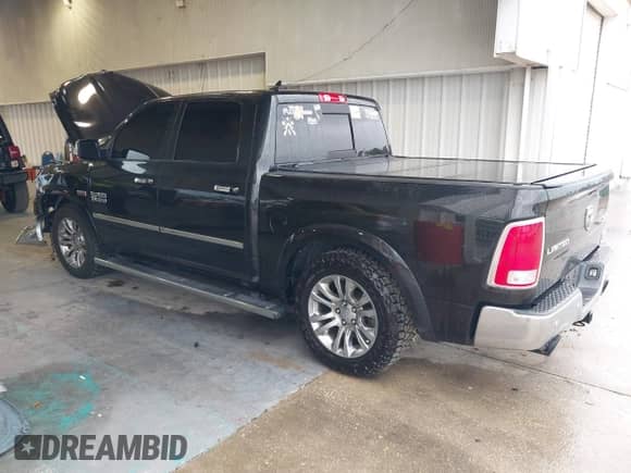 2015 Ram 1500 Laramie Longhorn с VIN 1C6RR7PT2FS660230, выставлен на аукционе IAAI как лот 43355515 с пробегом 51 977 миль миль и . История ставок и продаж доступна на DreamBid. Изображение 3.