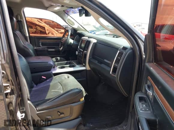 2016 Ram 1500 Laramie z VIN 1C6RR7NT5GS151639, wystawiony jako IAAI lot #43241196 z przebiegiem 150 825 mil mil oraz . Historia ofert i sprzedaży dostępna na DreamBid. Obrazek 5.