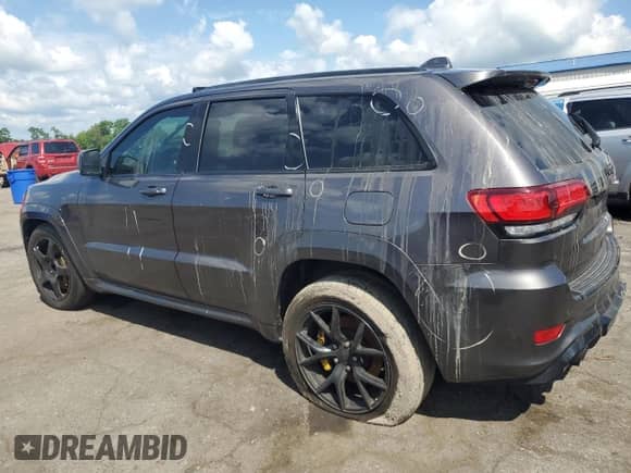 2021 Jeep Grand Cherokee Trackhawk z VIN 1C4RJFN99MC822394, wystawiony jako Copart lot #63350645 z przebiegiem Nie podano mil oraz Szkoda całkowita • Salvage title. Historia ofert i sprzedaży dostępna na DreamBid. Obrazek 2.