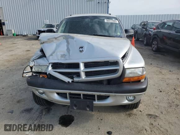 2002 Dodge Dakota Sport с VIN 1B7HG38N12S509862, выставлен на аукционе Copart как лот 56972995 с пробегом Не указан миль и На запчасти • Non repairable. История ставок и продаж доступна на DreamBid. Изображение 5.