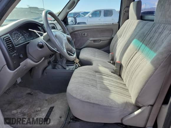 2001 Toyota Tacoma with VIN 5TENL42N51Z813395, listed as a Copart auction lot 82456405 with 144,970 mi miles and Salvage title. Bid and sale history available at DreamBid. Image 7.