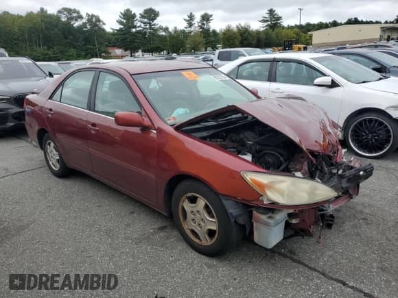 2002 Toyota Camry XLE z VIN 4T1BF32K02U023924, wystawiony jako Copart lot #80752185 z przebiegiem 117 715 mil mil oraz Nie do naprawy • Non repairable. Historia ofert i sprzedaży dostępna na DreamBid. Obrazek 4.