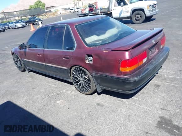 1993 Honda Accord with VIN 1HGCB7670PA032022, listed as a IAAI auction lot 43184554 with 235,609 mi miles and . Bid and sale history available at DreamBid. Image 3.